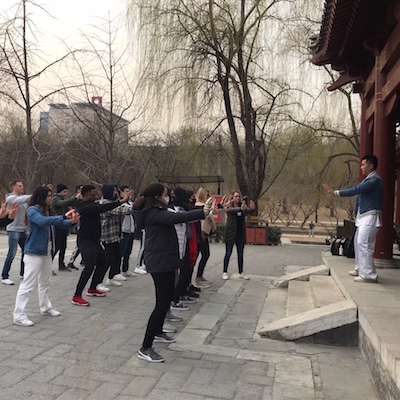 Students practicing feng sui in China Immersion 2019